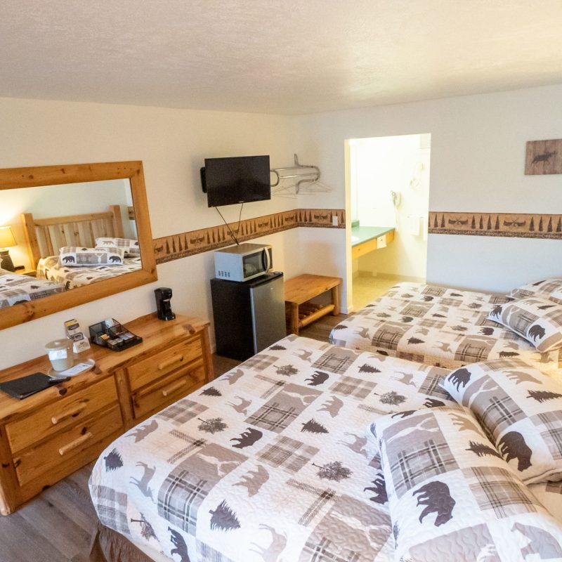 a bedroom with a bed in a room