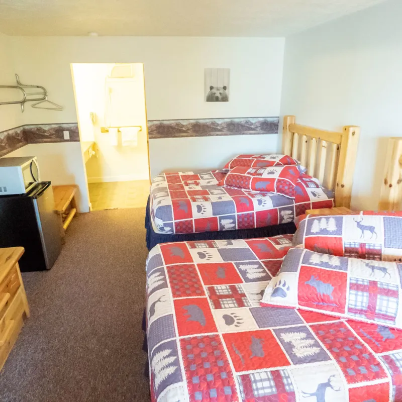 a bedroom with a bed in a room