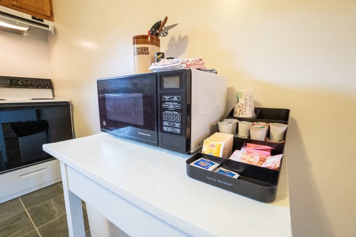 a microwave oven sitting on top of a table
