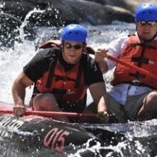 Two rafters on white water rapids